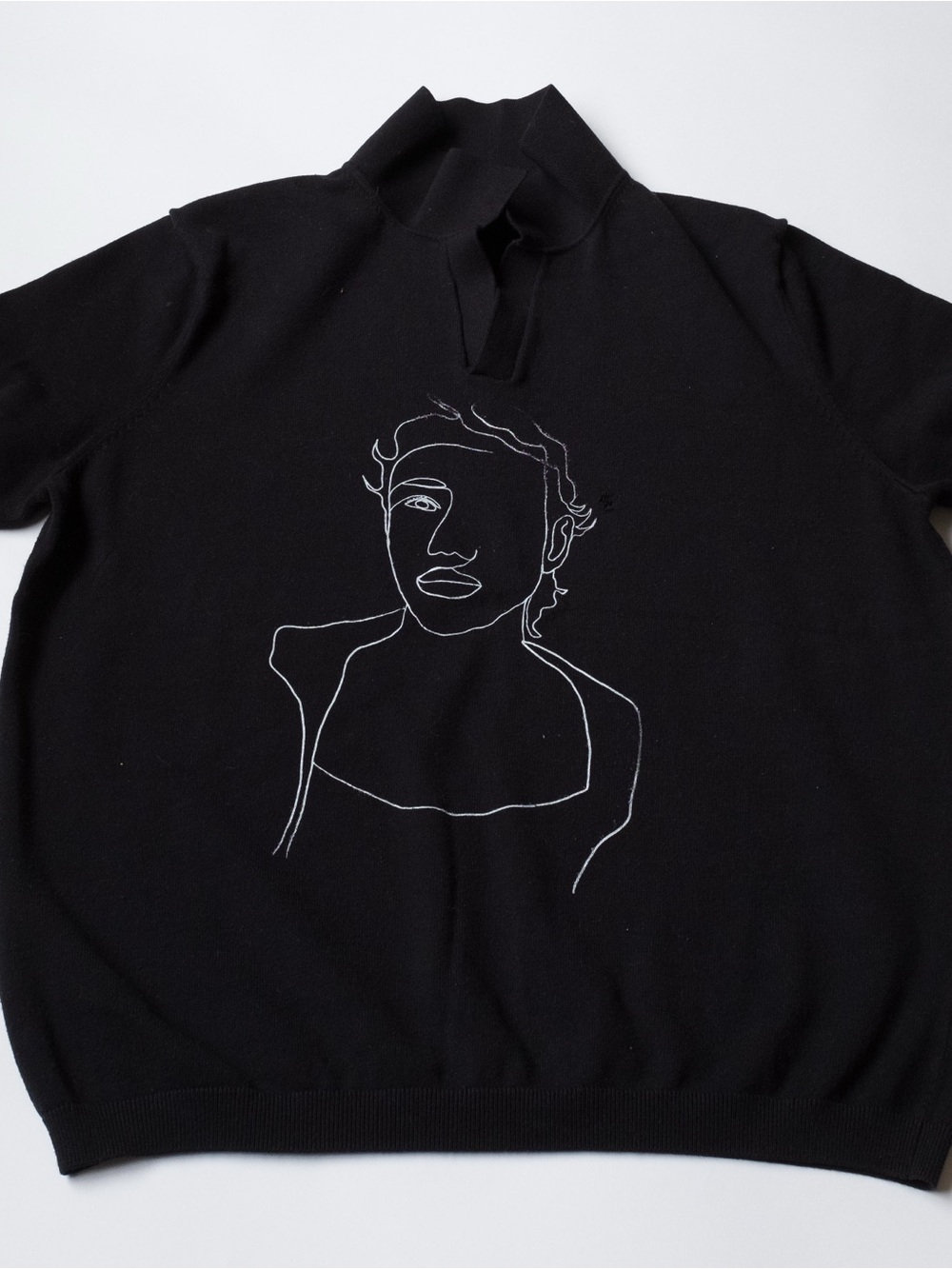Black Knit Pullover with White Line Portrait